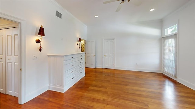 3739 N Hullen St, Metairie, LA 70002 - unfurnished bedroom with crown molding, light wood-style floors, recessed lighting, and ceiling fan