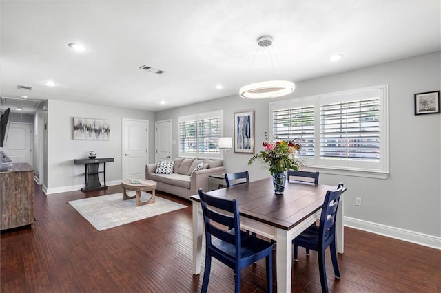 1200 Waltham St, Metairie, LA 70001 - dining space with wood finished floors, recessed lighting, and attic access