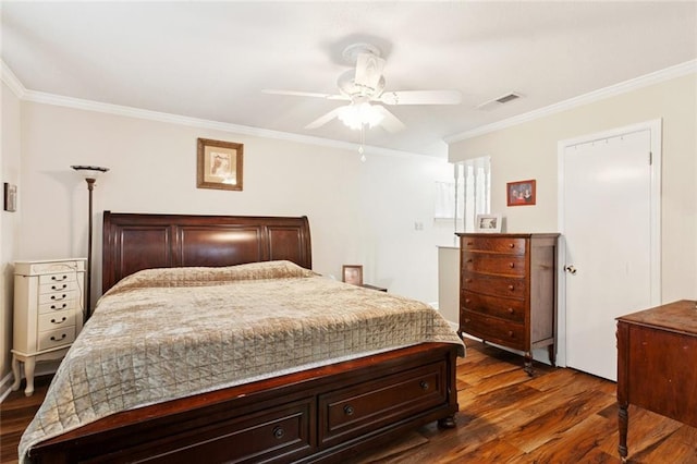 1404 Colony Pl, Metairie, LA 70003 - bedroom with crown molding, dark wood-style flooring, and ceiling fan
