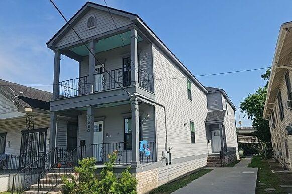 2678 Myrtle St, New Orleans, LA 70122 - view of front of property with a balcony and a porch