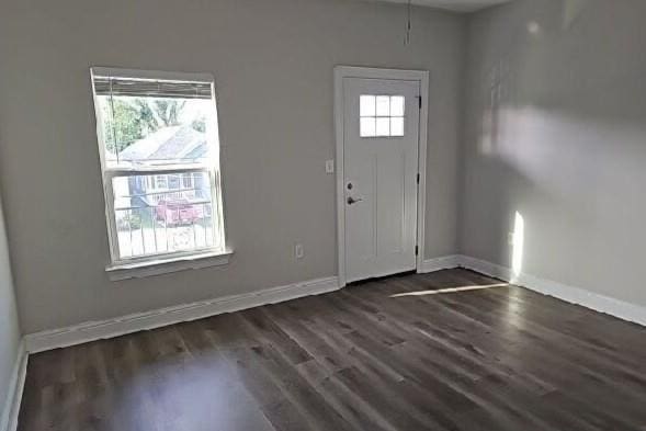 2678 Myrtle St, New Orleans, LA 70122 - foyer featuring baseboards and wood finished floors