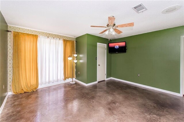 2129 Hamilton St, Franklinton, LA 70438 - empty room with concrete floors and ceiling fan