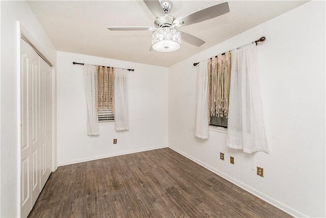 2129 Hamilton St, Franklinton, LA 70438 - unfurnished bedroom with wood finished floors, a closet, and a ceiling fan