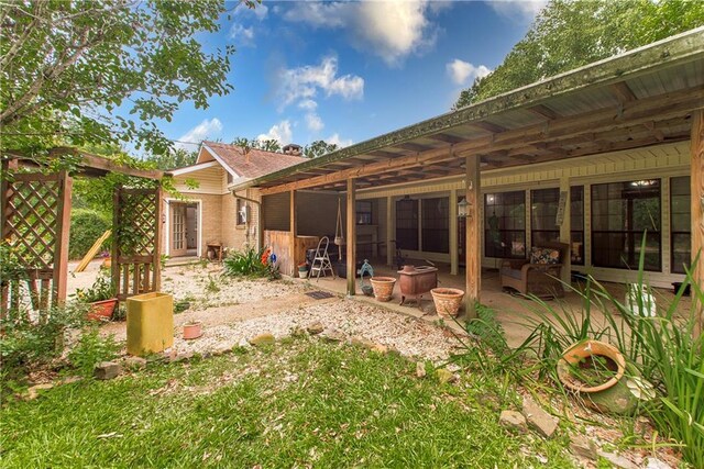 2129 Hamilton St, Franklinton, LA 70438 - rear view of house with a patio area