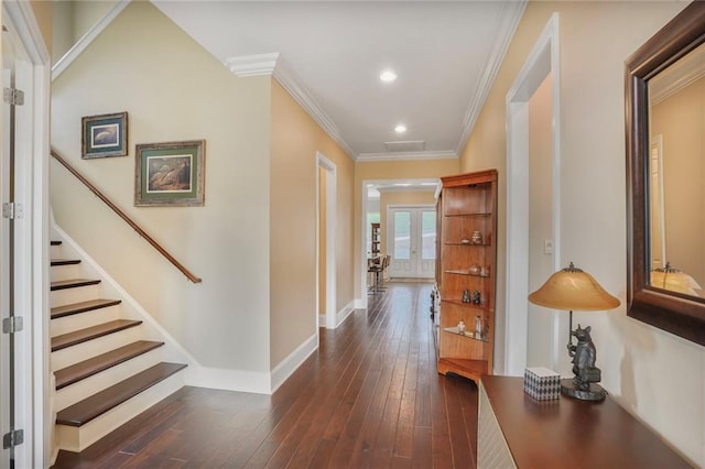 6938 Milne Blvd, New Orleans, LA 70124 - hallway featuring recessed lighting, dark wood-style floors, ornamental molding, and stairs