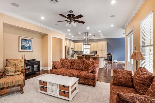 6938 Milne Blvd, New Orleans, LA 70124 - living room with crown molding, wood finished floors, recessed lighting, and ceiling fan