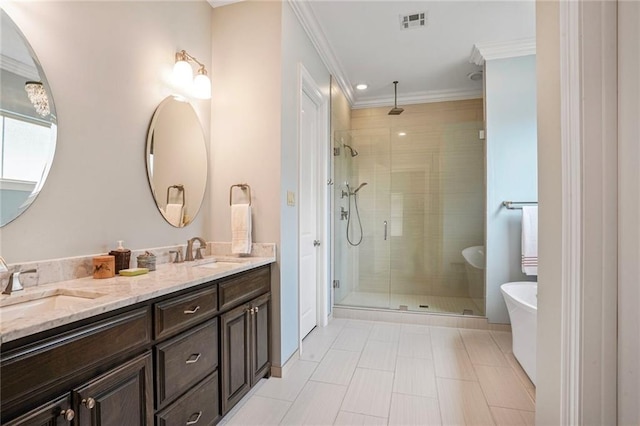 6938 Milne Blvd, New Orleans, LA 70124 - full bathroom with a stall shower, double vanity, ornamental molding, a freestanding tub, and tile patterned flooring