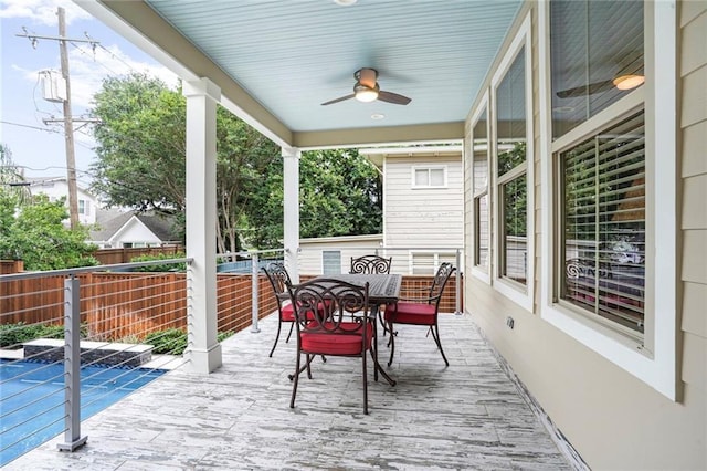 6938 Milne Blvd, New Orleans, LA 70124 - wooden deck featuring a ceiling fan and outdoor dining area