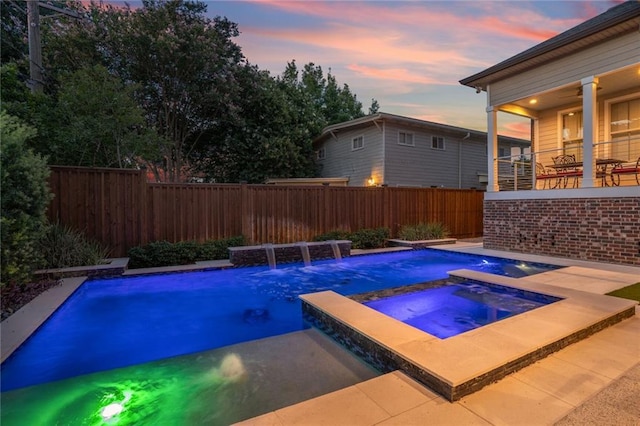 6938 Milne Blvd, New Orleans, LA 70124 - view of swimming pool with an in-ground hot tub and a fenced backyard