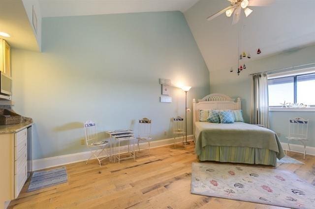 7300 Lakeshore Dr Unit 6, New Orleans, LA 70124 - bedroom with wood finished floors, high vaulted ceiling, and ceiling fan