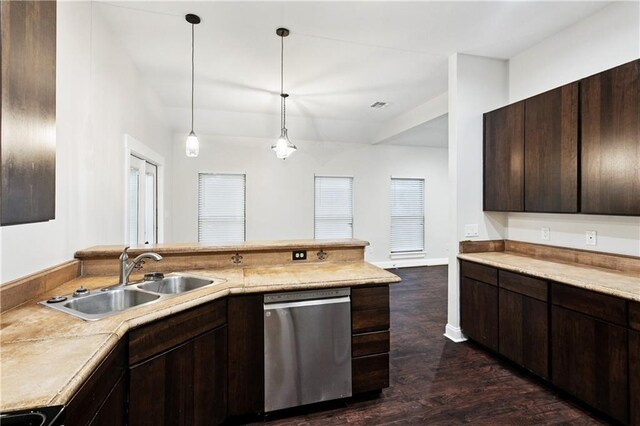 22562 2nd St, Mandeville, LA 70471 - kitchen featuring stainless steel dishwasher, dark brown cabinets, dark wood-type flooring, light countertops, and decorative light fixtures
