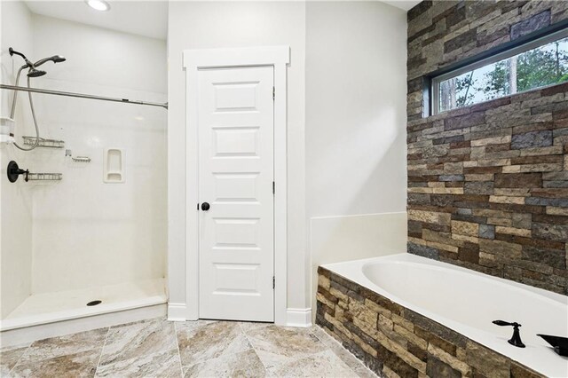 22562 2nd St, Mandeville, LA 70471 - bathroom with a bath and a shower