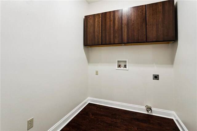 22562 2nd St, Mandeville, LA 70471 - washroom with cabinet space, hookup for a washing machine, hookup for an electric dryer, and dark wood-style flooring