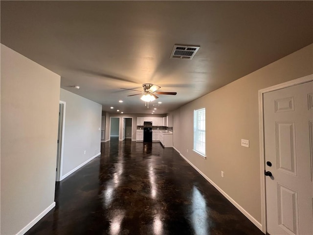 360507 Park Blvd, Chalmette, LA 70043 - unfurnished living room with ceiling fan, finished concrete floors, and recessed lighting