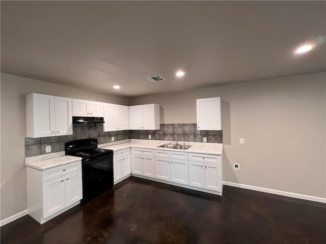 360507 Park Blvd, Chalmette, LA 70043 - kitchen with black stove, exhaust hood, light countertops, decorative backsplash, and recessed lighting