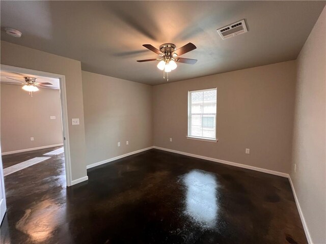 360507 Park Blvd, Chalmette, LA 70043 - empty room featuring ceiling fan, finished concrete floors, and a smoke detector