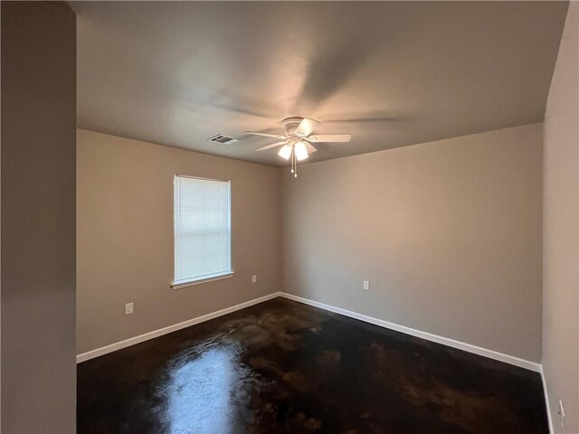 360507 Park Blvd, Chalmette, LA 70043 - spare room featuring a ceiling fan and concrete floors