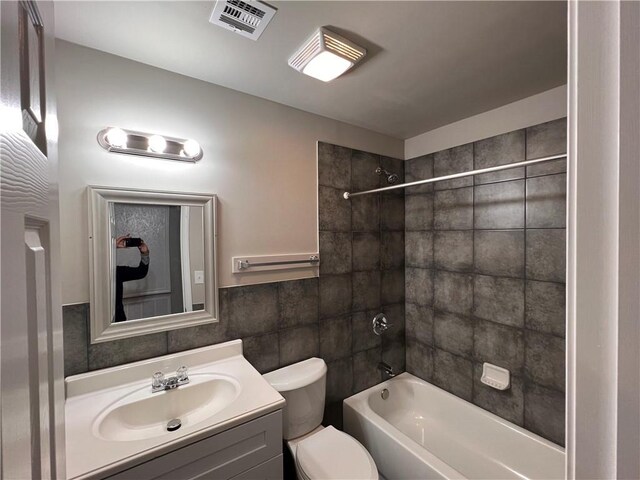 360507 Park Blvd, Chalmette, LA 70043 - bathroom with vanity, shower / tub combination, and tile walls