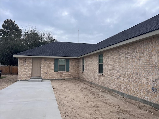 360507 Park Blvd, Chalmette, LA 70043 - view of front of home with a shingled roof and brick siding