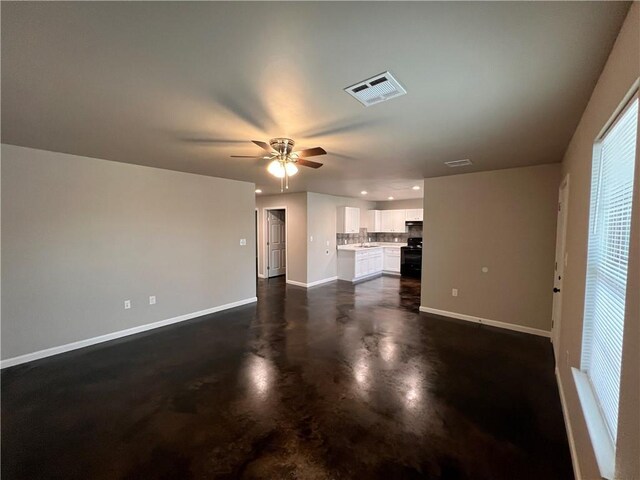 360507 Park Blvd, Chalmette, LA 70043 - unfurnished living room with a ceiling fan, concrete floors, and recessed lighting