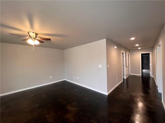 360507 Park Blvd, Chalmette, LA 70043 - unfurnished room with finished concrete flooring, ceiling fan, and recessed lighting