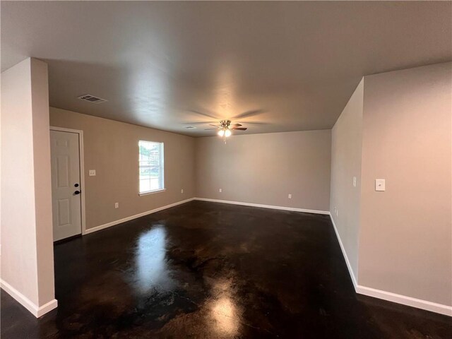 360507 Park Blvd, Chalmette, LA 70043 - spare room featuring concrete flooring and a ceiling fan