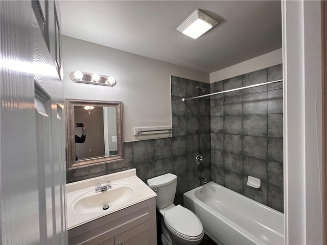 360507 Park Blvd, Chalmette, LA 70043 - bathroom featuring vanity, shower / washtub combination, and tile walls