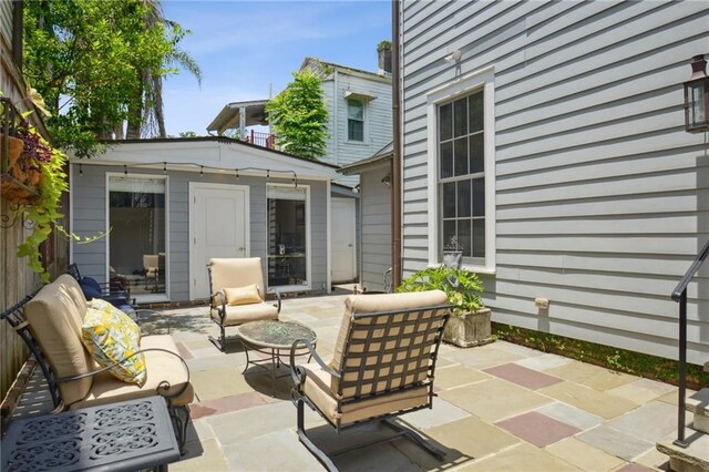 1128 Fourth St, New Orleans, LA 70130 - view of patio / terrace featuring outdoor lounge area