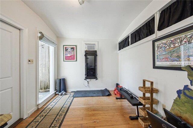 1128 Fourth St, New Orleans, LA 70130 - exercise room with vaulted ceiling and wood finished floors