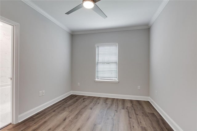 1704-1706 S Dupre St, New Orleans, LA 70125 - empty room featuring wood finished floors, a ceiling fan, and ornamental molding