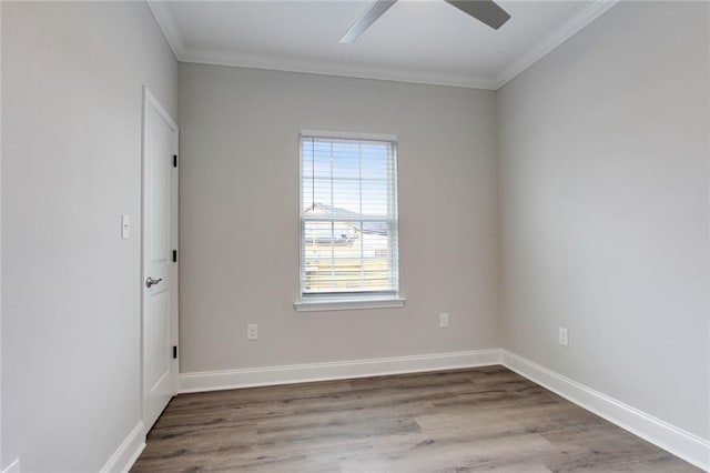 1704-1706 S Dupre St, New Orleans, LA 70125 - unfurnished room featuring ornamental molding, wood finished floors, and a ceiling fan