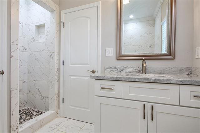 1704-1706 S Dupre St, New Orleans, LA 70125 - bathroom featuring vanity, marble finish flooring, and a marble finish shower