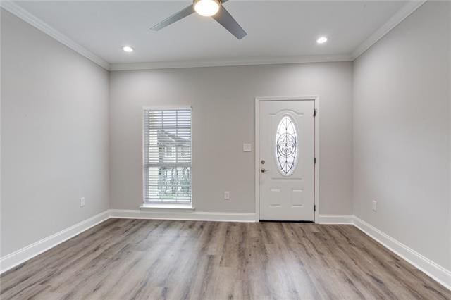 1704-1706 S Dupre St, New Orleans, LA 70125 - foyer featuring crown molding, ceiling fan, wood finished floors, and recessed lighting