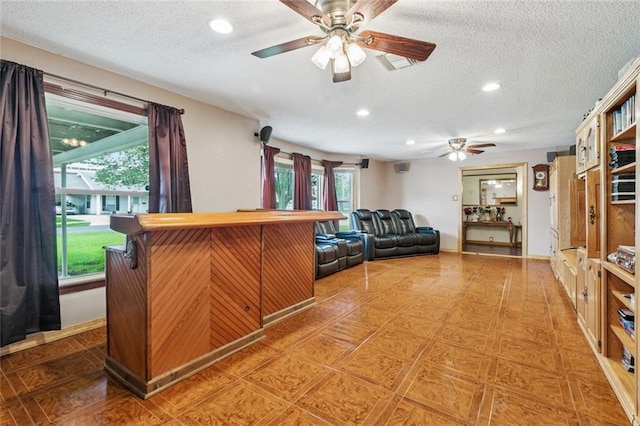 4520 13th St, Marrero, LA 70072 - interior space featuring ceiling fan, a textured ceiling, and recessed lighting