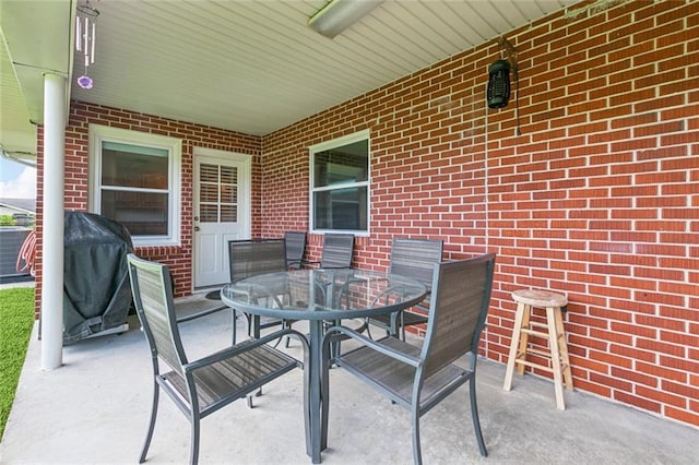 4520 13th St, Marrero, LA 70072 - view of patio featuring outdoor dining area and a grill
