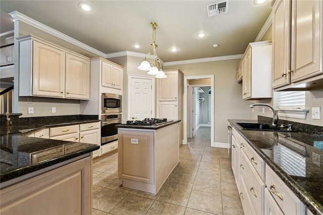 142 Colony Rd, Belle Chasse, LA 70037 - kitchen featuring appliances with stainless steel finishes, dark stone counters, crown molding, decorative light fixtures, and light tile patterned flooring