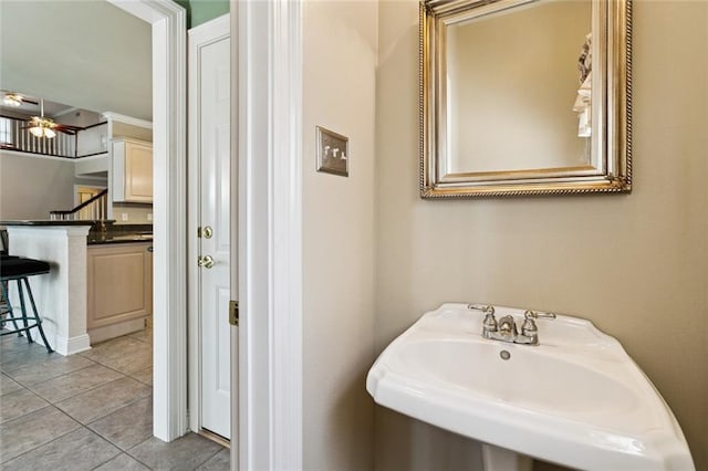 142 Colony Rd, Belle Chasse, LA 70037 - bathroom with tile patterned floors and ceiling fan