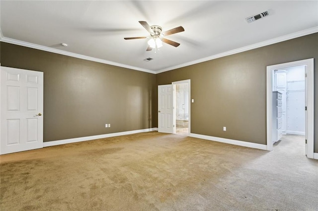 142 Colony Rd, Belle Chasse, LA 70037 - unfurnished bedroom featuring carpet floors, ornamental molding, a ceiling fan, and connected bathroom