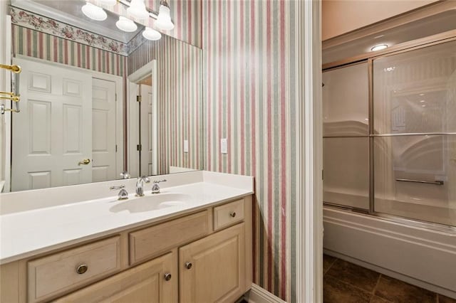 142 Colony Rd, Belle Chasse, LA 70037 - full bath with wallpapered walls, vanity, and enclosed tub / shower combo
