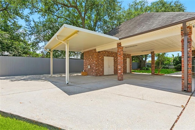 142 Colony Rd, Belle Chasse, LA 70037 - view of patio / terrace with concrete driveway and an attached carport