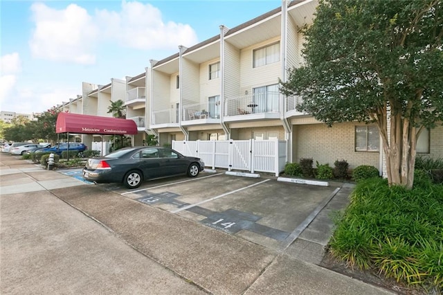3805 Houma Blvd Unit B221, Metairie, LA 70006 - view of building exterior featuring uncovered parking