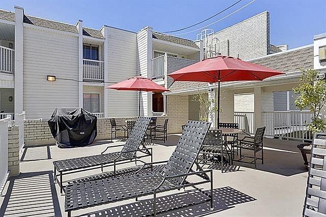 3805 Houma Blvd Unit B221, Metairie, LA 70006 - view of patio with a grill