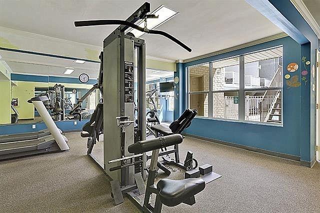 3805 Houma Blvd Unit B221, Metairie, LA 70006 - gym with ornamental molding and carpet floors
