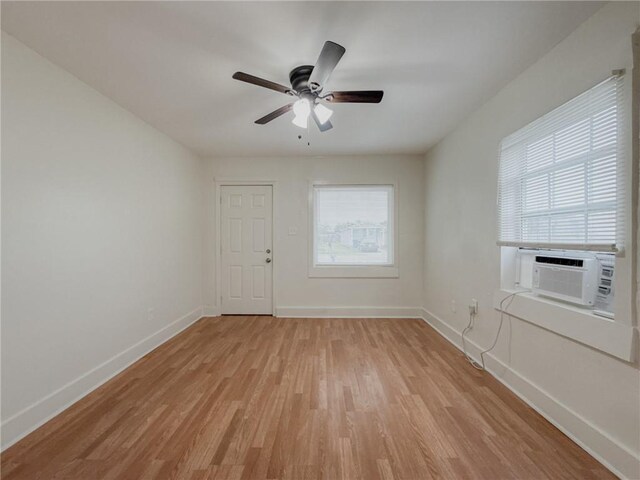 134648 S Dilton St, Metairie, LA 70003 - spare room with light wood-type flooring, a ceiling fan, and cooling unit