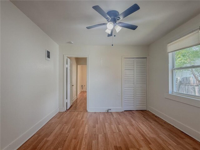 134648 S Dilton St, Metairie, LA 70003 - empty room featuring light wood-style flooring and a ceiling fan