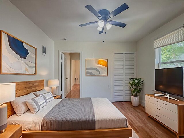 134648 S Dilton St, Metairie, LA 70003 - bedroom with a closet, light wood finished floors, and ceiling fan