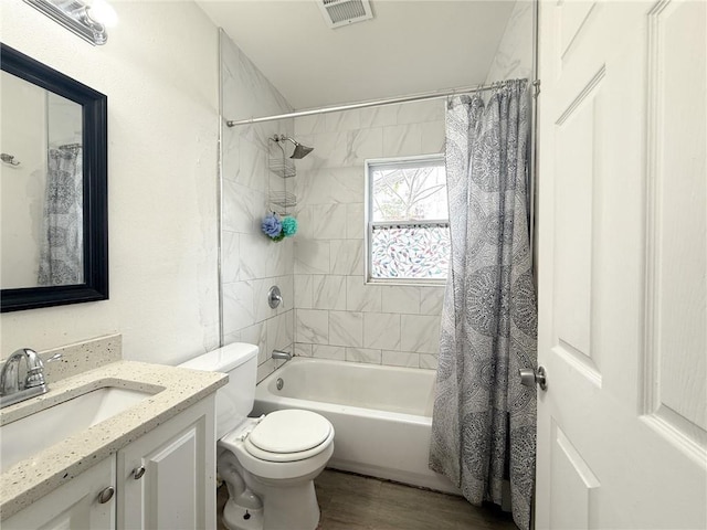 134648 S Dilton St, Metairie, LA 70003 - full bath featuring vanity, shower / tub combo, and wood finished floors