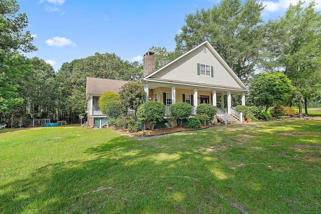 126 Gemstone Dr, Franklinton, LA 70438 - neoclassical home with a porch, a front lawn, and a chimney