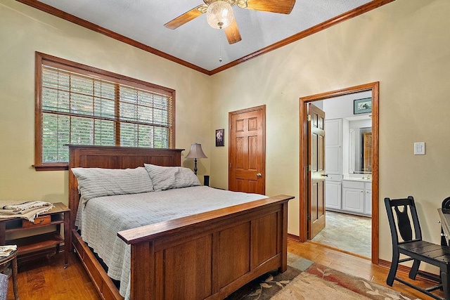 126 Gemstone Dr, Franklinton, LA 70438 - bedroom featuring light wood-type flooring, crown molding, ceiling fan, and connected bathroom
