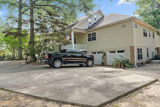 126 Gemstone Dr, Franklinton, LA 70438 - view of property exterior with driveway and an attached garage